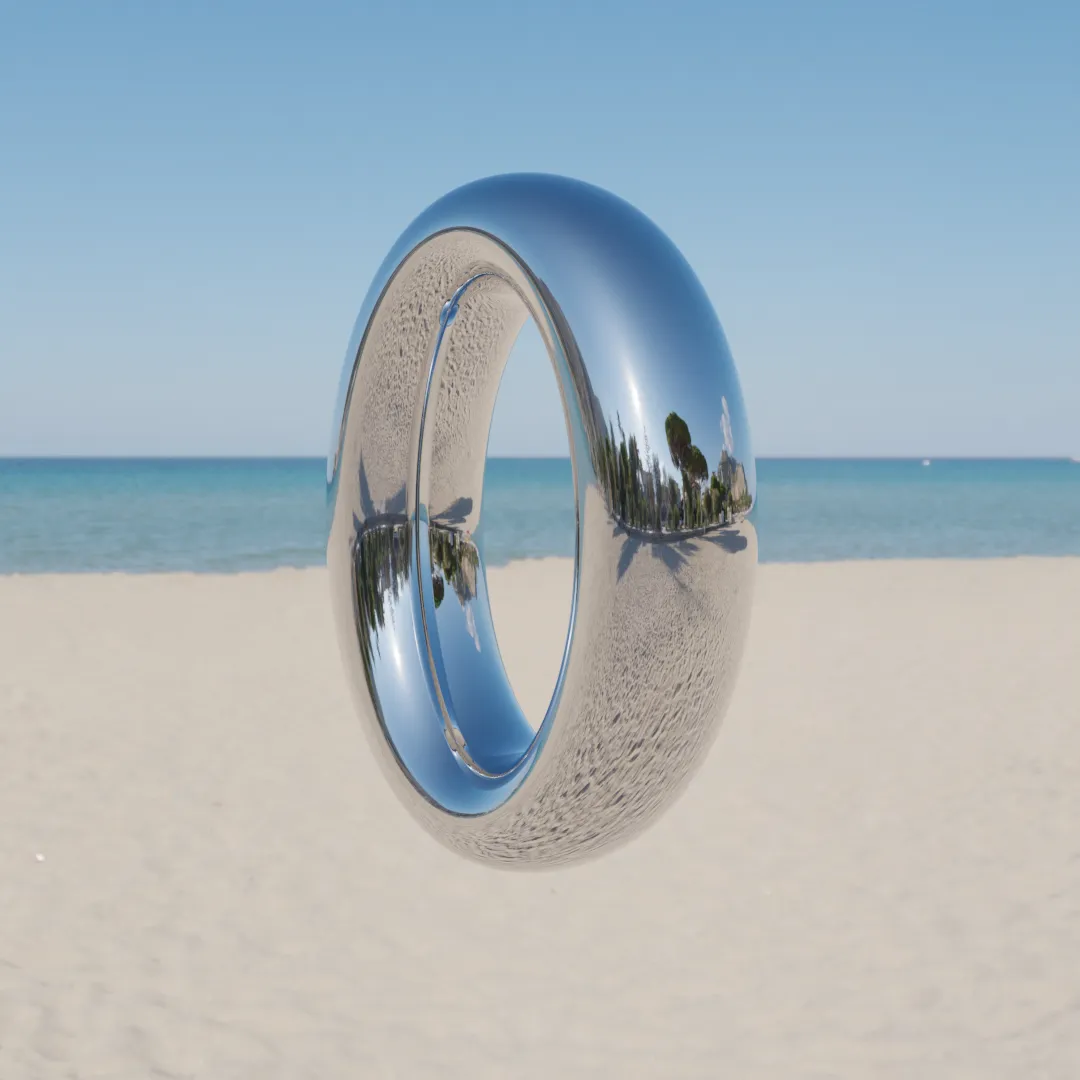 A ring of highly reflective silvery metal hangs in front of an idyllic beach scene